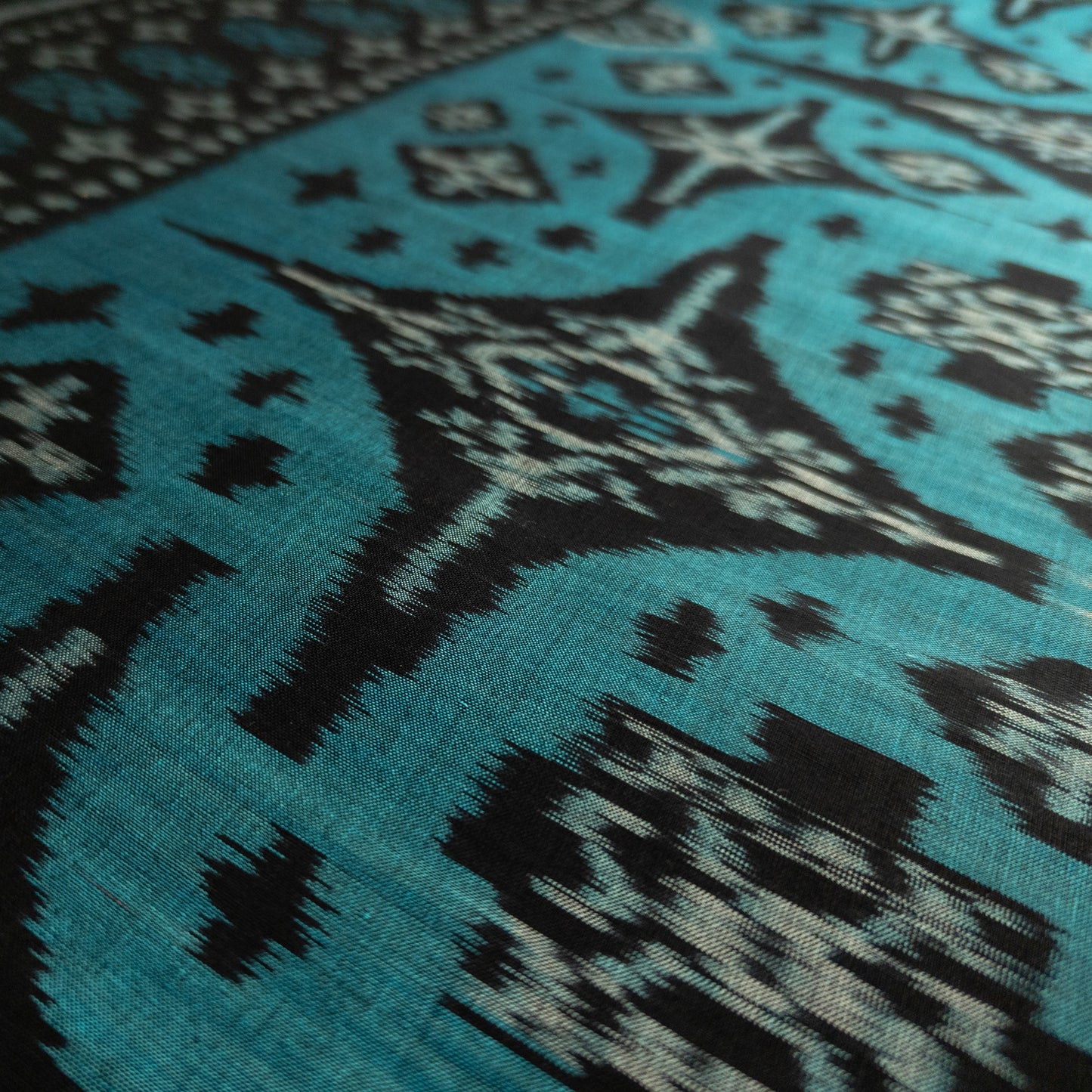 Black and Turquoise Ikat Fabric - Handwoven in Bali