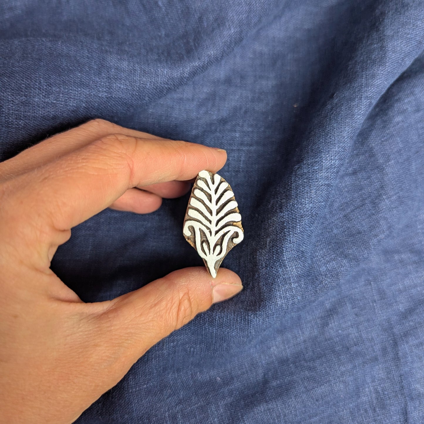 Stylised leaf stamp for printing block print fabric, batik or clay.