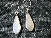 Photo 2 of our White shell and silver teardrop earrings