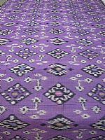 Photo 1 of our Deep Purple Ikat fabric