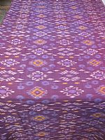 Photo 1 of our Aubergine and Mauve Ikat Fabric