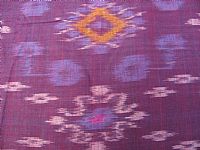 Photo 4 of our Aubergine and Mauve Ikat Fabric