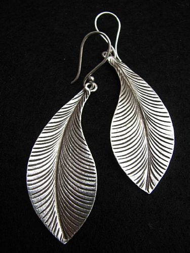 Photo of our Curvey leaf long earrings