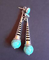 Photo 2 of our Long dramatic silver earrings