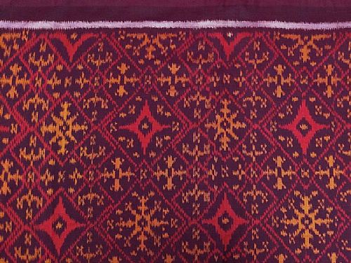 Photo of our Burgundy and Red Ikat Fabric