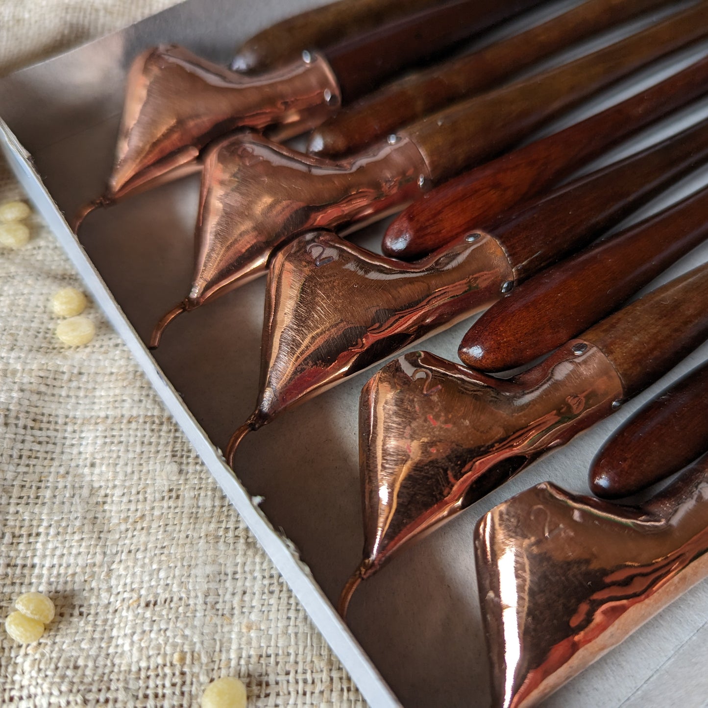 Batik Tjantings handmade from copper and teak in Indonesia.