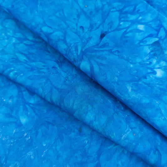 bright blue leaf pattern batik fabric