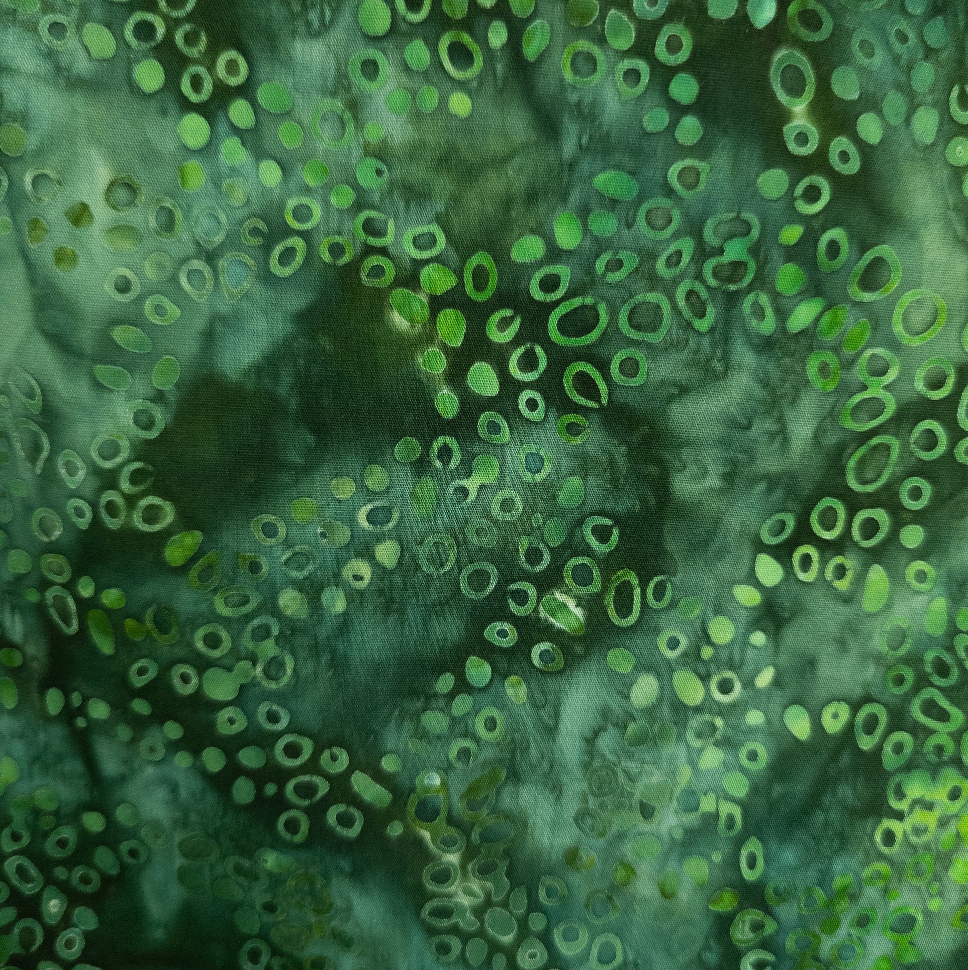 Handmade batik fabric from Java with an abstract circles pattern