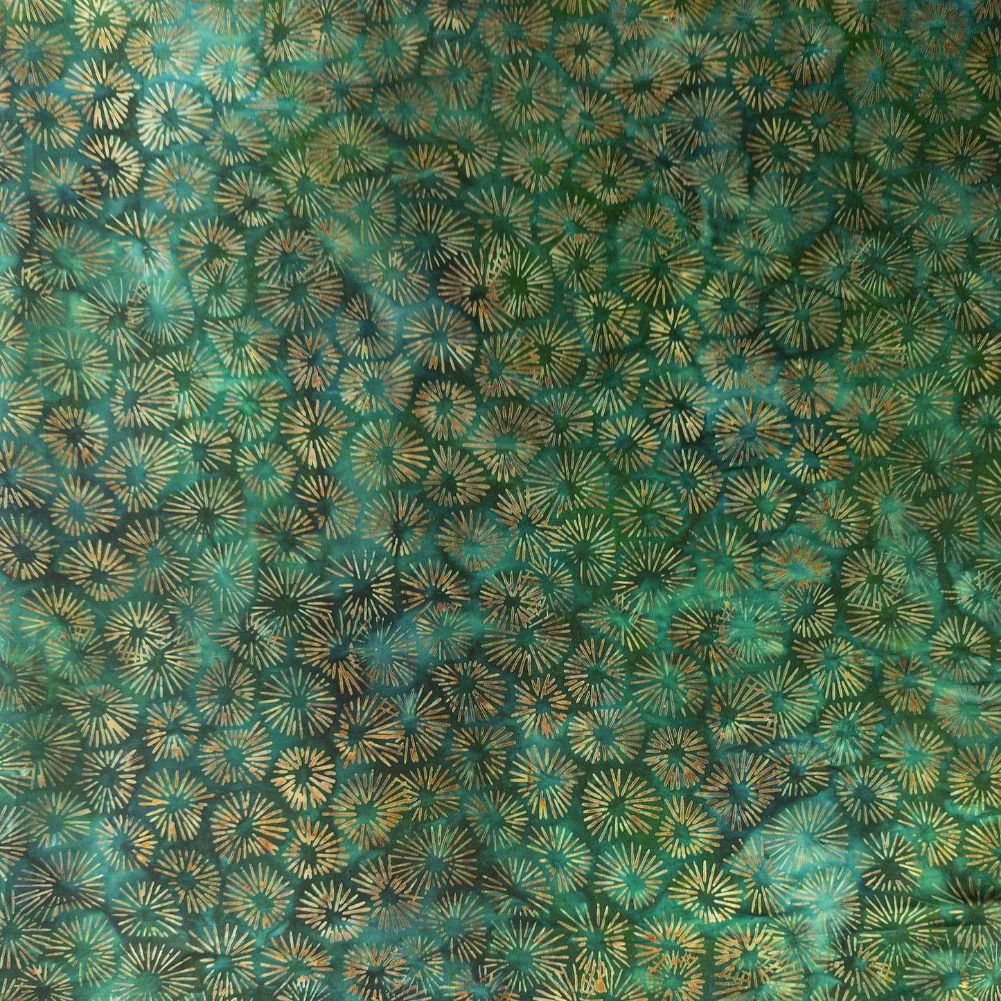 hand printed cotton batik fabric with green and brown stardust print