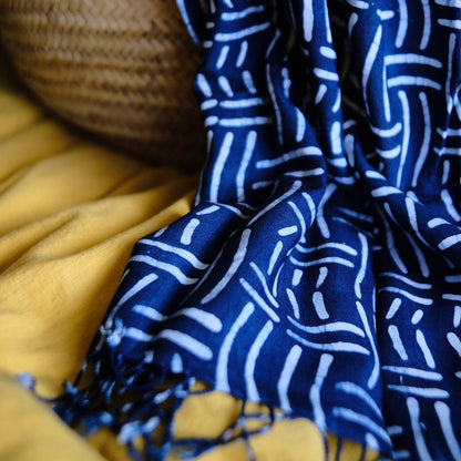 Natural dyed indigo scarf with stamped batik pattern.