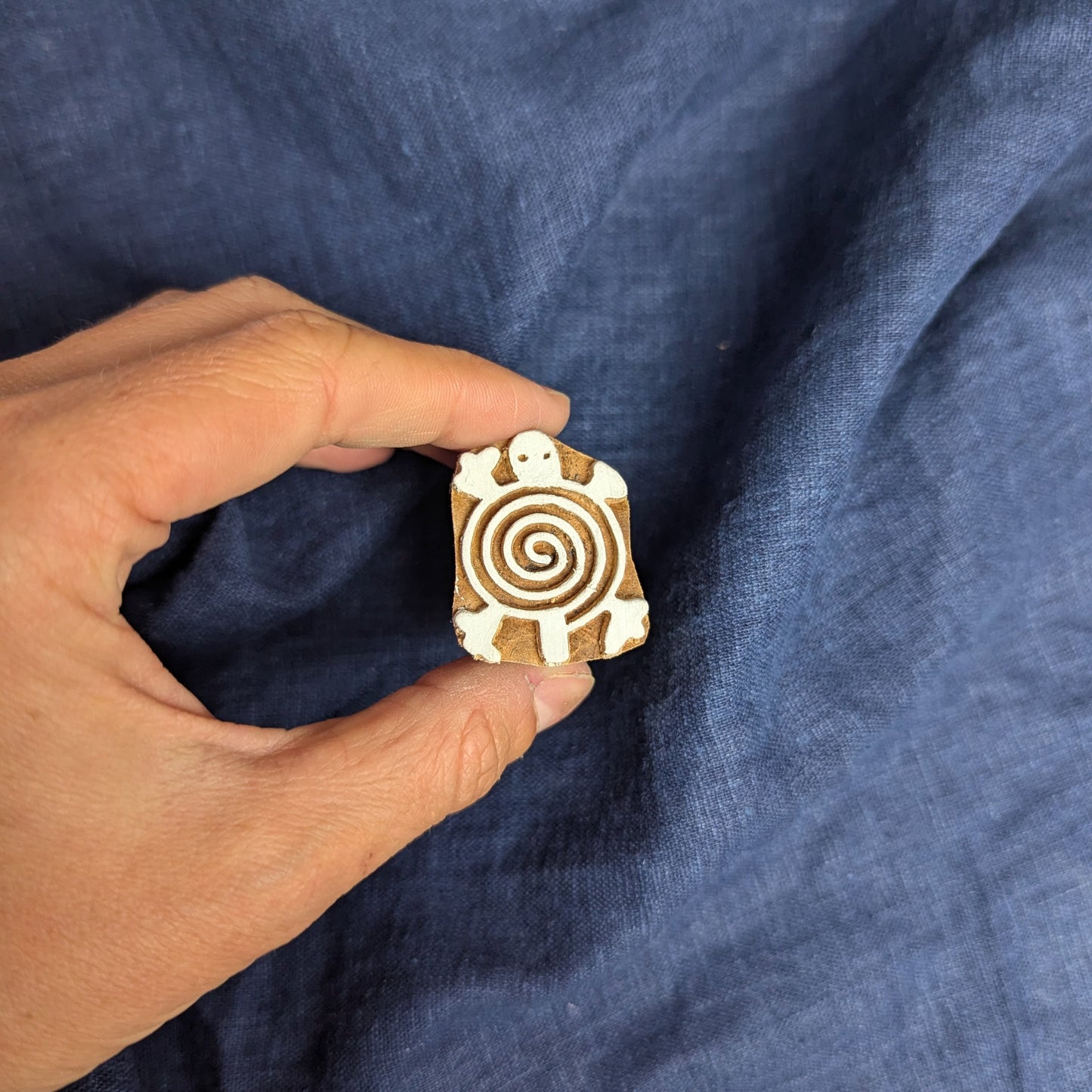 Small turtle wood block with spiral shell