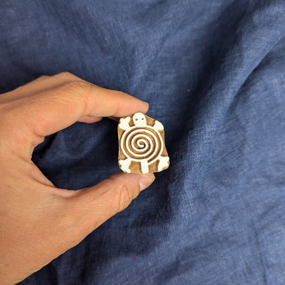 Small turtle wood block with spiral shell
