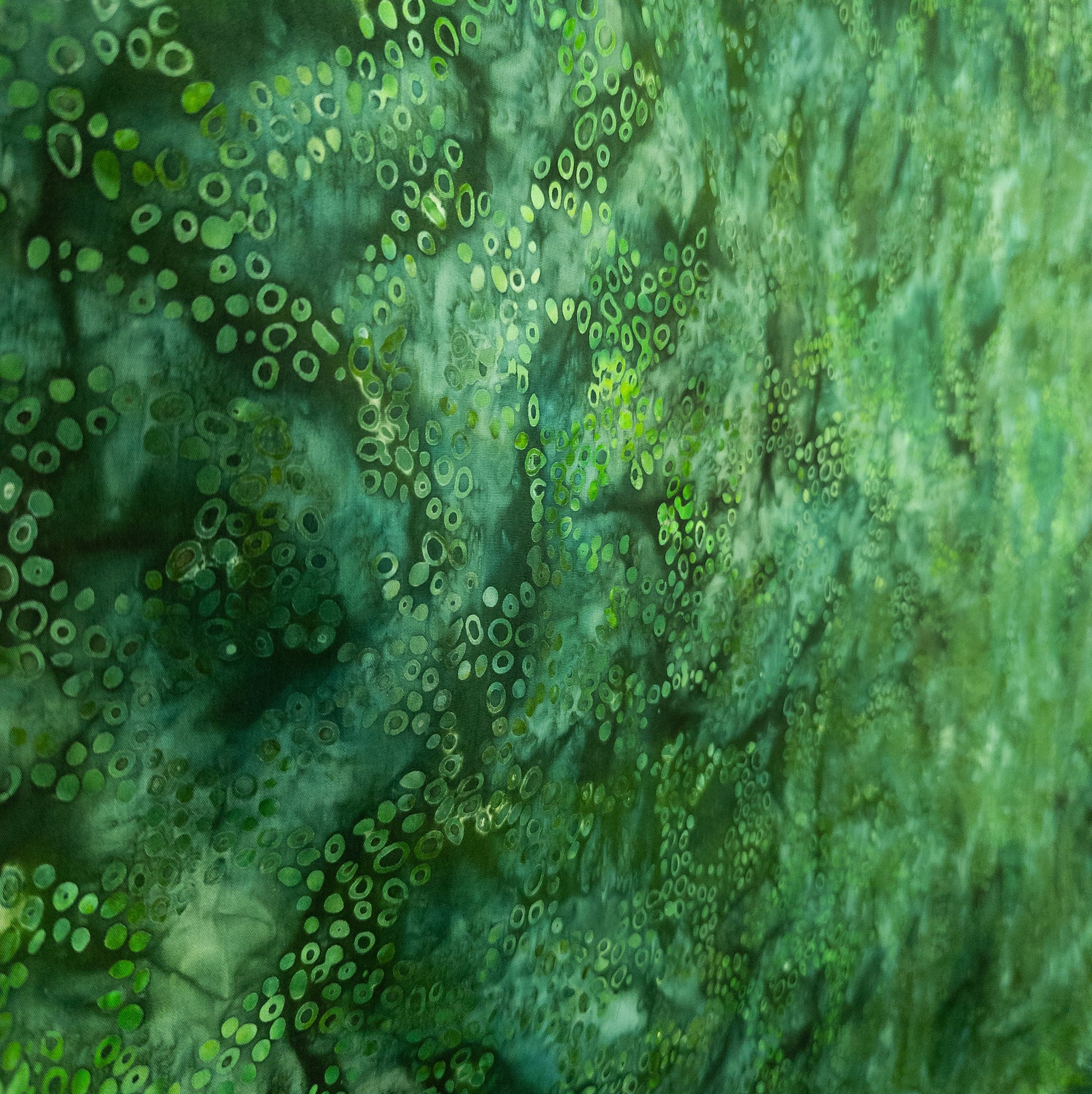 Nature inspired batik fabric in green abstract pattern
