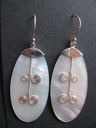 Photo of our White shell and silver spiral earrings