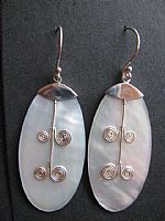 White shell and silver spiral earrings