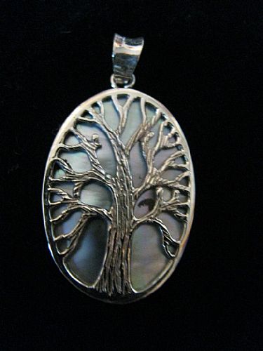Photo of our Oval Tree of Life silver pendant
