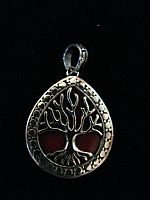 Photo 1 of our Teardrop Tree of Life silver pendant