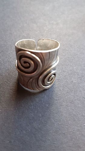 Photo of our Double spiral wide silver ring