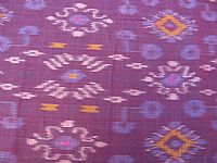 Photo 3 of our Aubergine and Mauve Ikat Fabric