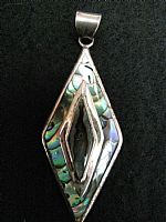 Paua shell and silver pendant