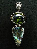 Silver pendant with onyx and paua shell