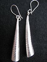 Photo of our Silver trumpet earrings