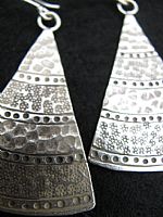 Photo 3 of our Stamped silver triangles