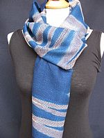 Photo 1 of our Indigo and rosewood handwoven scarf