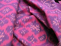 Photo 8 of our Deep Aubergines Ikat Fabric