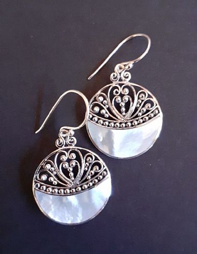 Photo of our Filigree white shell and silver earrings