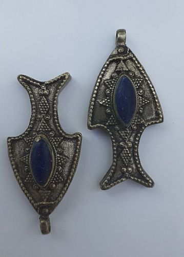 Photo of our Tibetan fish pendant